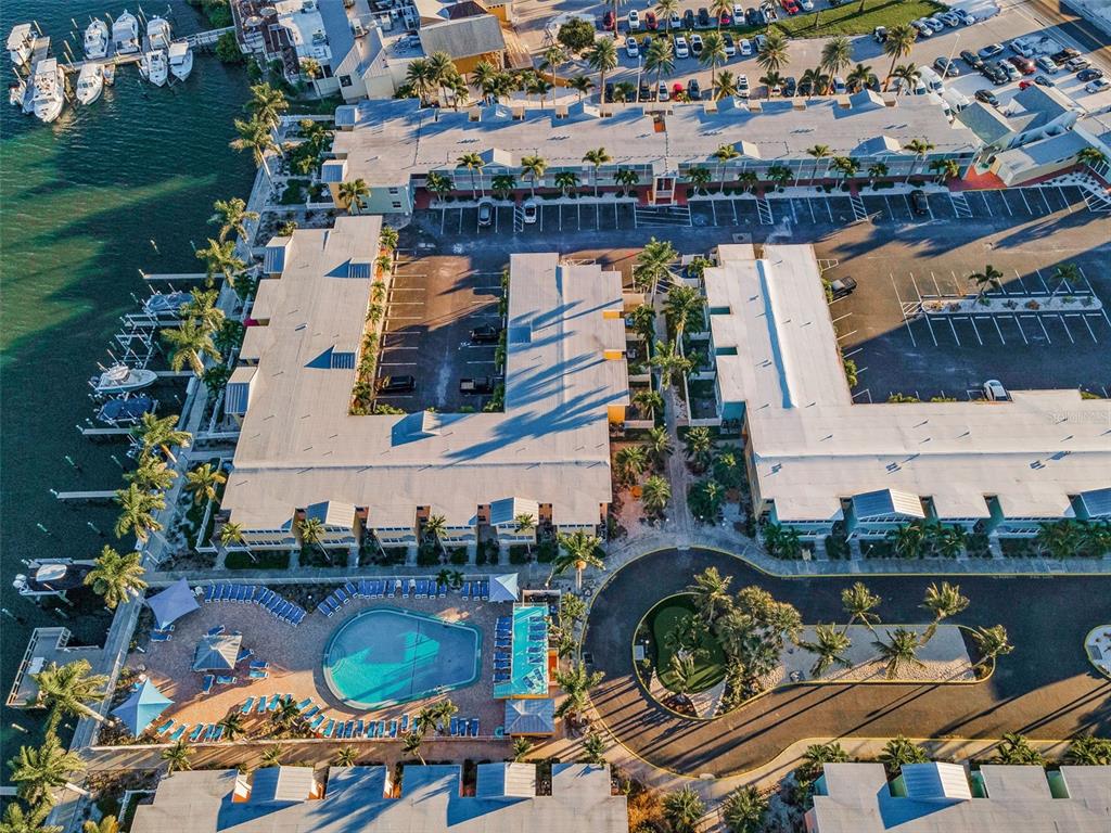 19417 Gulf Boulevard, Unit F207 Indian Rocks Beach, FL 33785 - Photo 34 of 56 an aerial view of houses with outdoor space