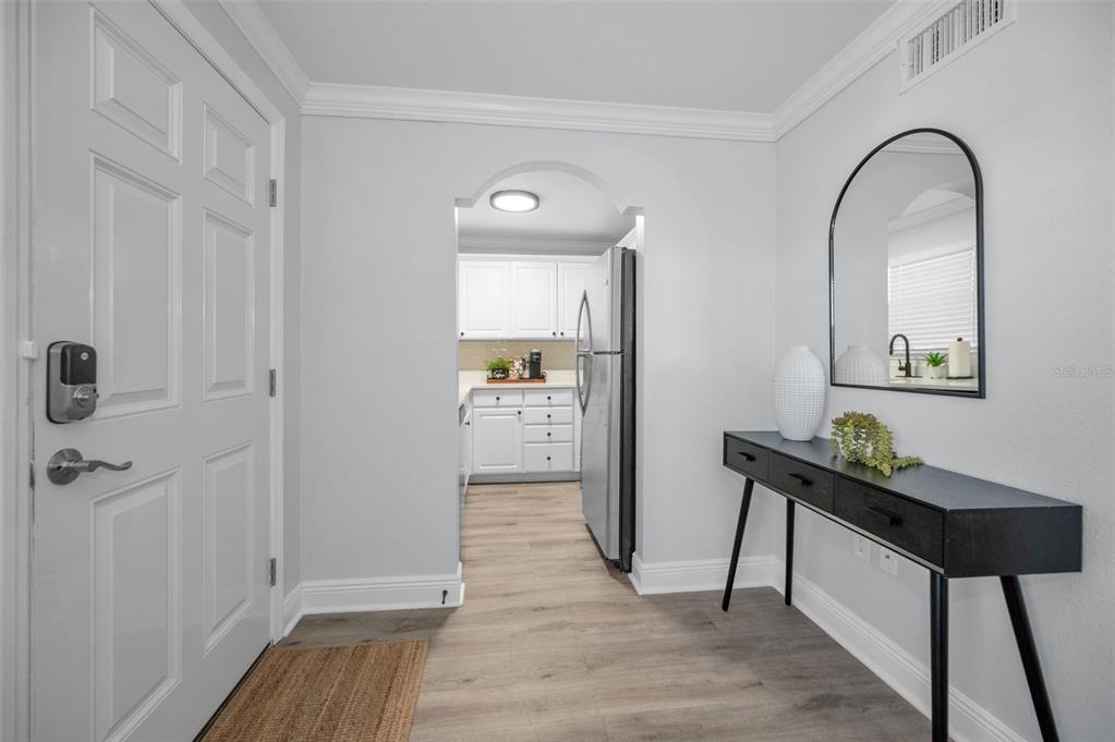 19417 Gulf Boulevard, Unit F207 Indian Rocks Beach, FL 33785 - Photo 7 of 56 a view of room with window and wooden floor