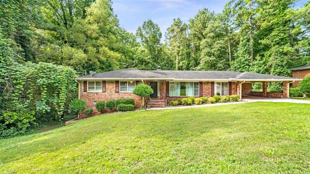 3323 Flat Shoals Road Decatur, GA 30034 - Photo 1 of 1 Beautiful, all brick ranch nestled among trees.