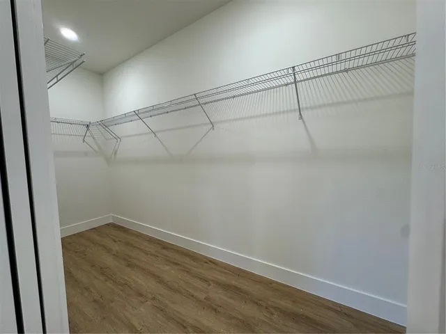 a view of a room with racks on the wall