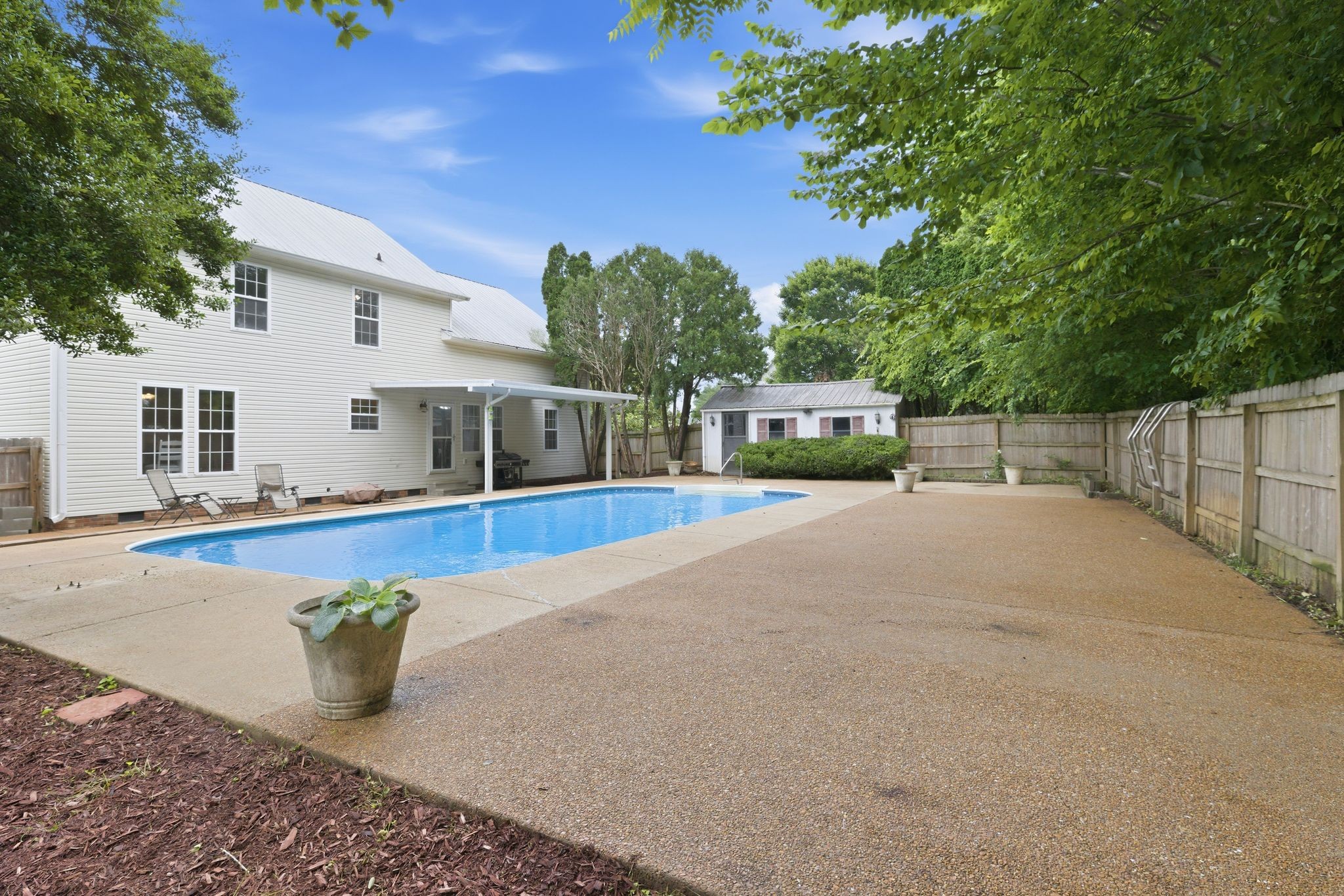 615 Vaughan's Gap Road Spring Hill, TN 37174 - Photo 2 of 26 a view of house with swimming pool outdoor seating