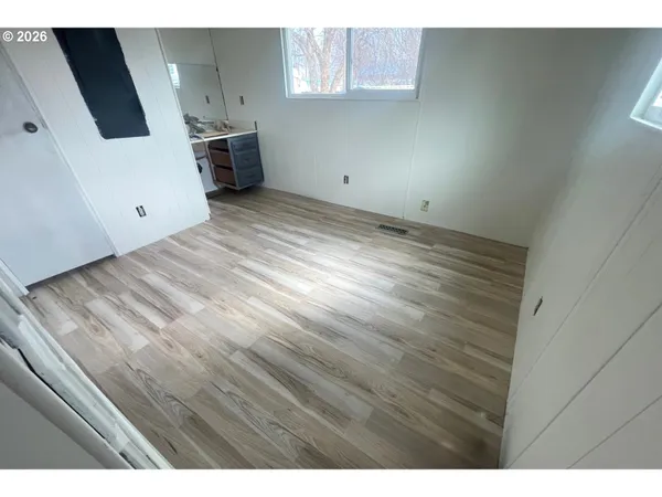 a view of a kitchen with a sink