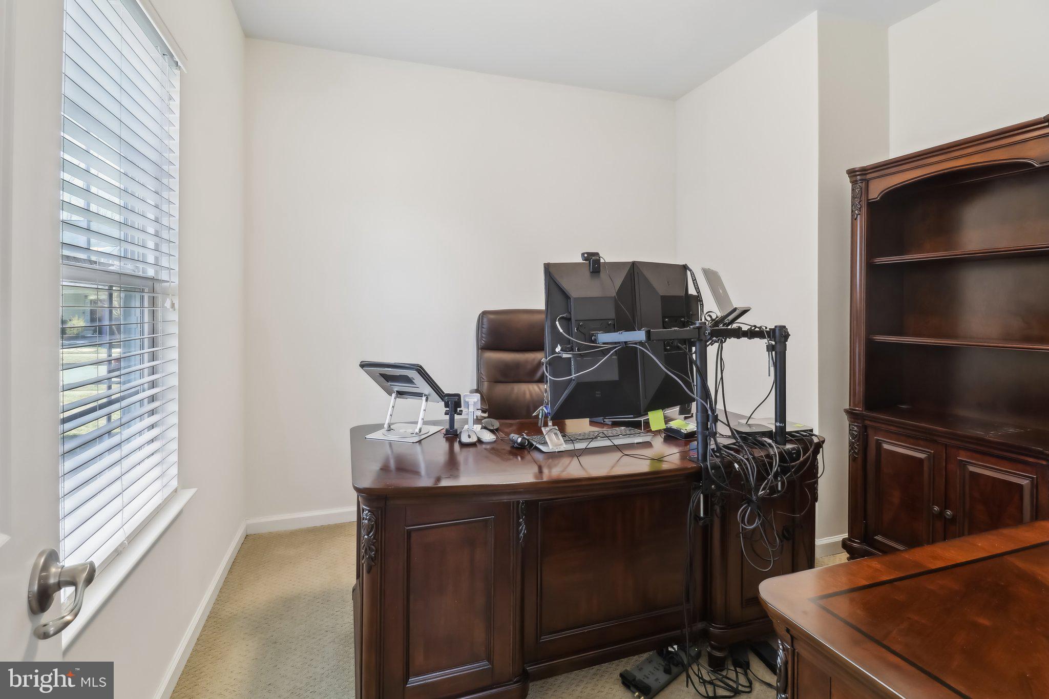 14013 Wheel Wright Place Accokeek, MD 20607 - Photo 24 of 38 a view of workspace with wooden floor