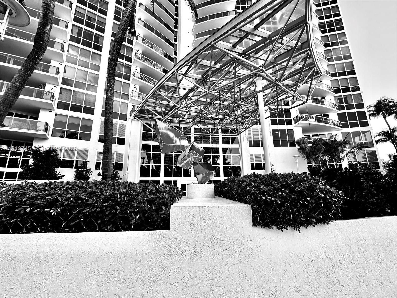 400 Alton Road, Unit 407 Miami Beach, FL 33139 - Photo 30 of 74 407 enjoys morning glimpses of the Strong Architectural Lines - watch the sunrise dance between the open spaces and highlights on the townhouses , different and stunning light.