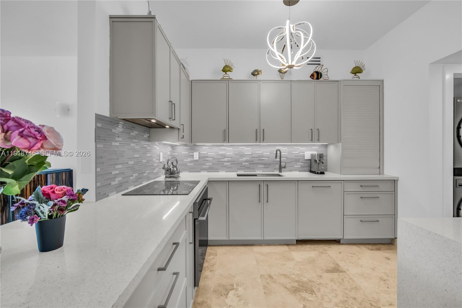 400 Alton Road, Unit 407 Miami Beach, FL 33139 - Photo 6 of 74 Beautiful redone well thought out kitchen. One of the few lines that has a full kitchen as opposed to a galley kitchen.