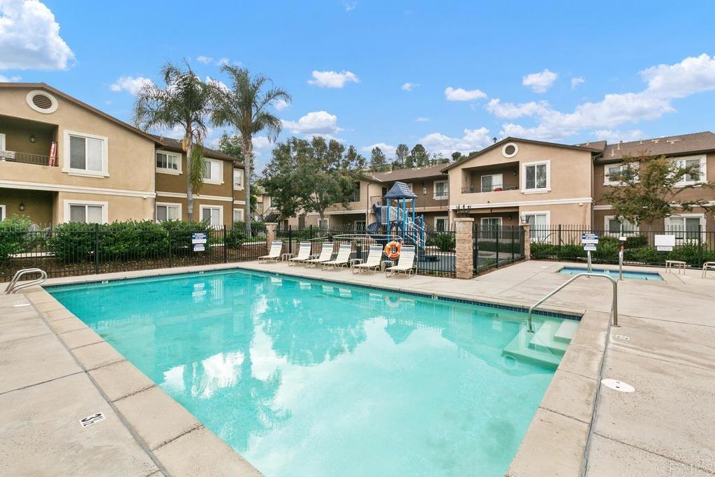 9728 Marilla Drive, Unit 712 Lakeside, CA 92040 - Photo 21 of 25 a view of a swimming pool with a patio