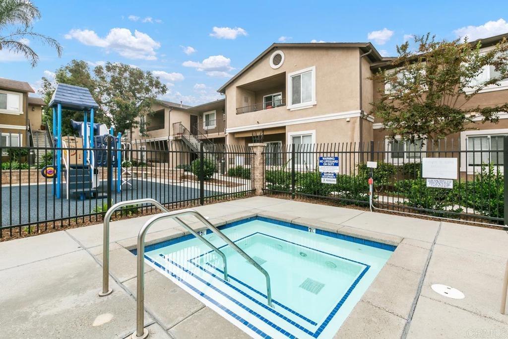 9728 Marilla Drive, Unit 712 Lakeside, CA 92040 - Photo 22 of 25 a view of a house with swimming pool and sitting area