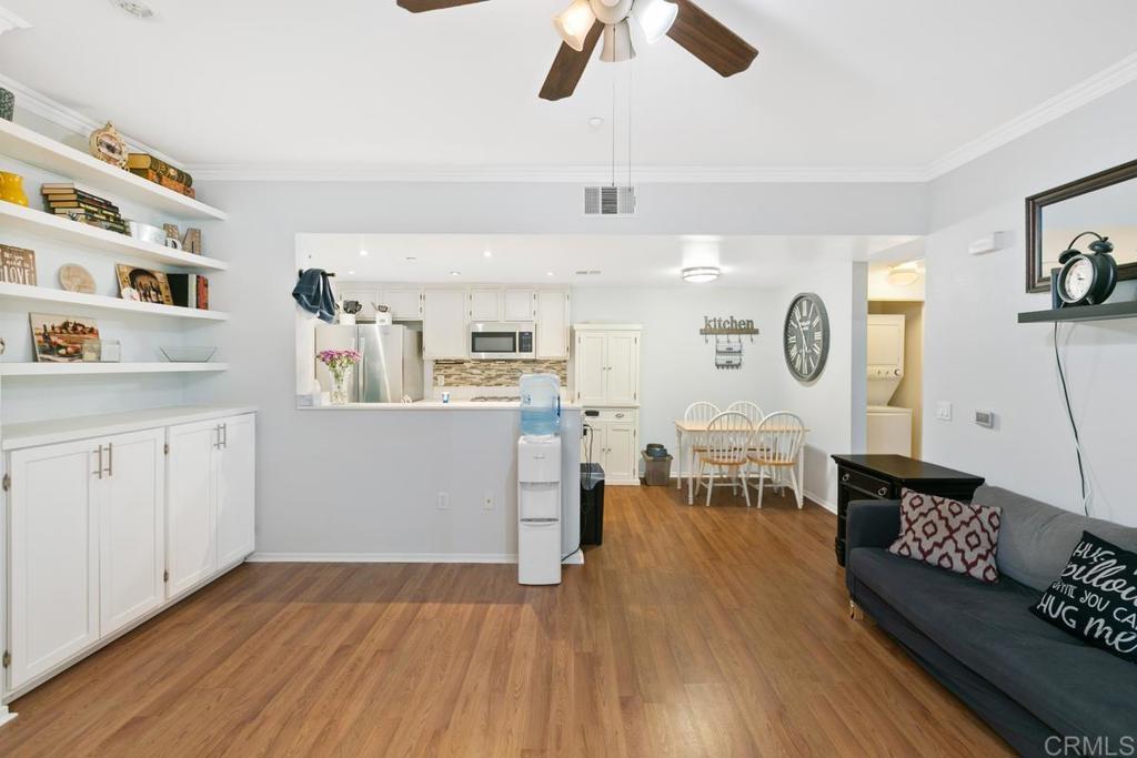 9728 Marilla Drive, Unit 712 Lakeside, CA 92040 - Photo 3 of 25 a living room with furniture and wooden floor