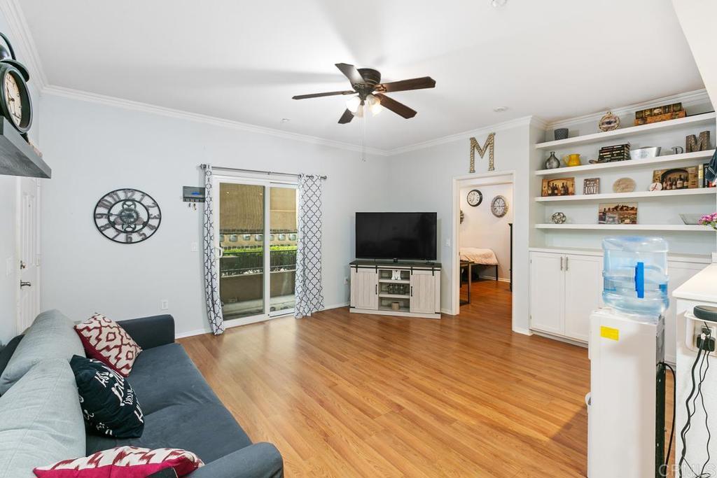 9728 Marilla Drive, Unit 712 Lakeside, CA 92040 - Photo 4 of 25 a living room with furniture and a flat screen tv