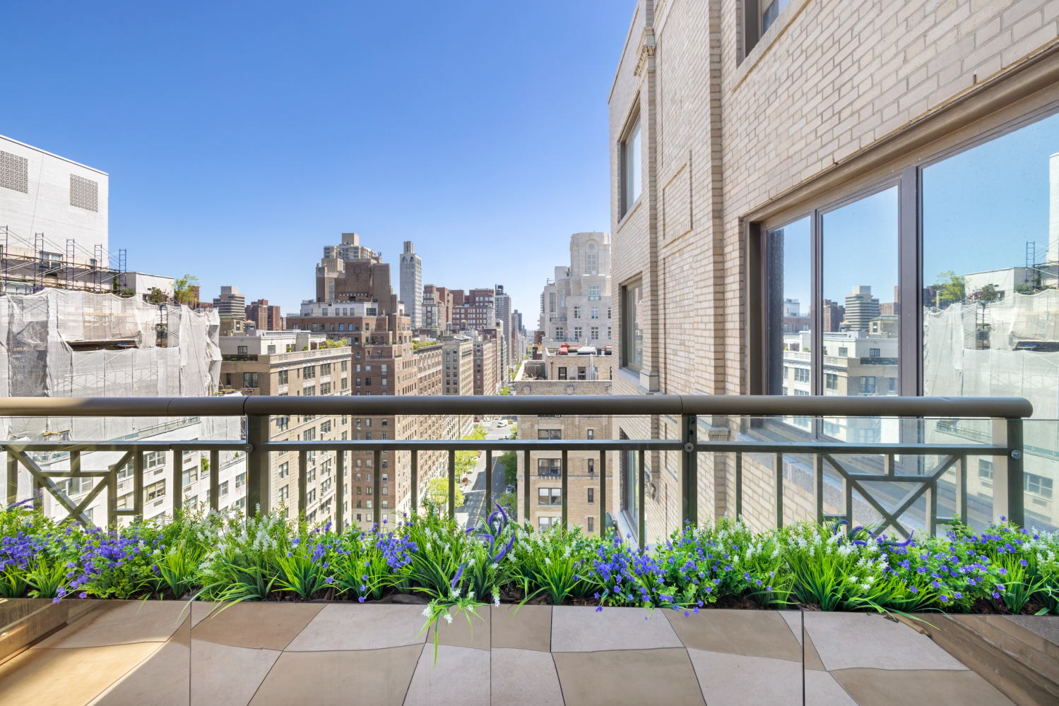 1049 5th Avenue, Unit 19B Manhattan, NY 10028 - Photo 13 of 20 a view of a balcony with wooden floor