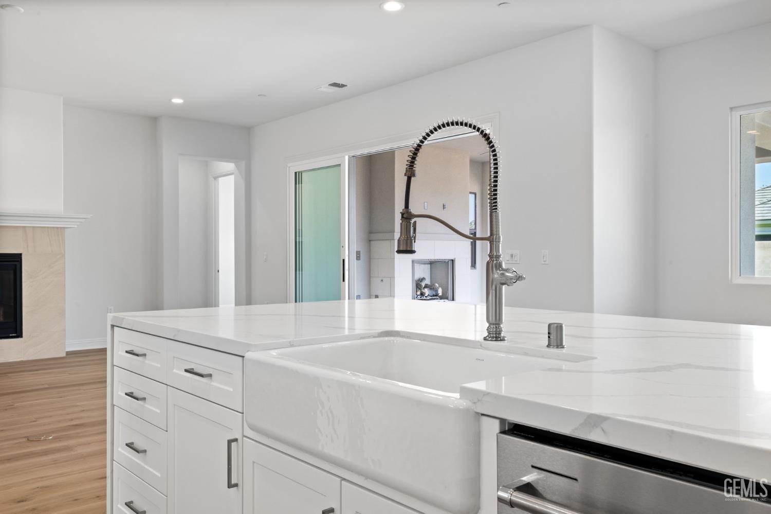 Undisclosed Address Bakersfield, CA 93311 - Photo 25 of 71 a bathroom with a sink and a mirror