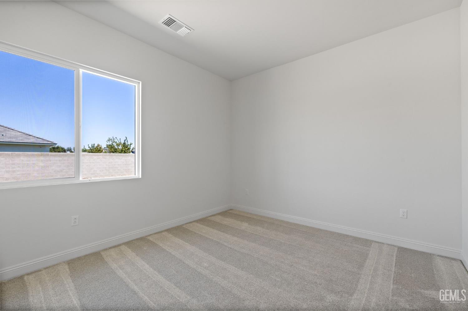 Undisclosed Address Bakersfield, CA 93311 - Photo 35 of 71 an empty room with a window