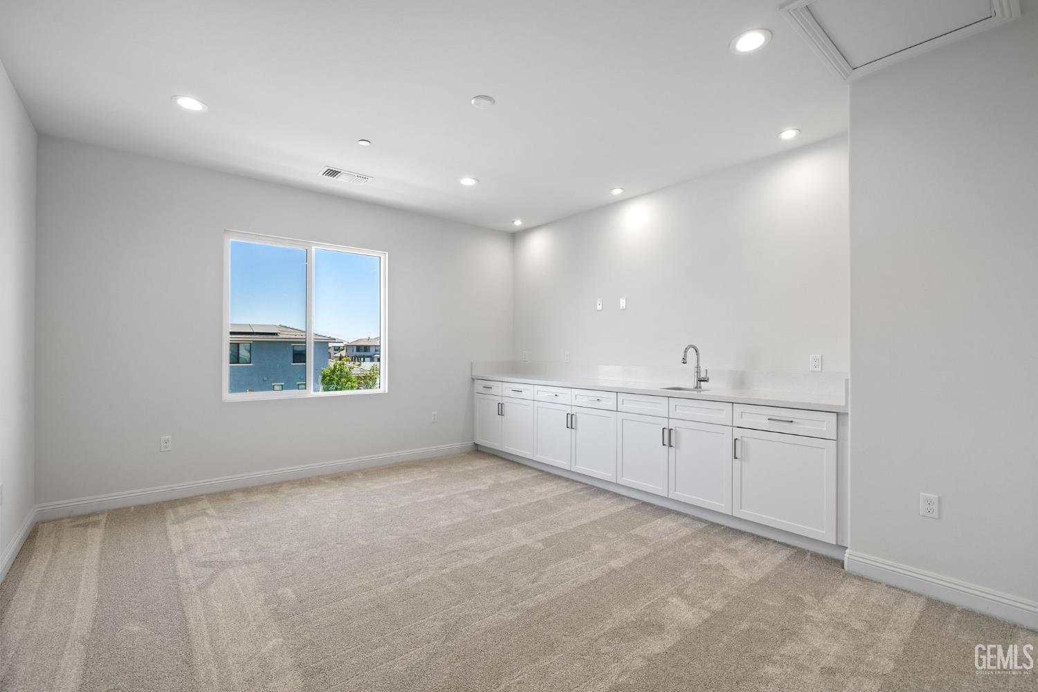 Undisclosed Address Bakersfield, CA 93311 - Photo 42 of 71 a view of an empty room with a window