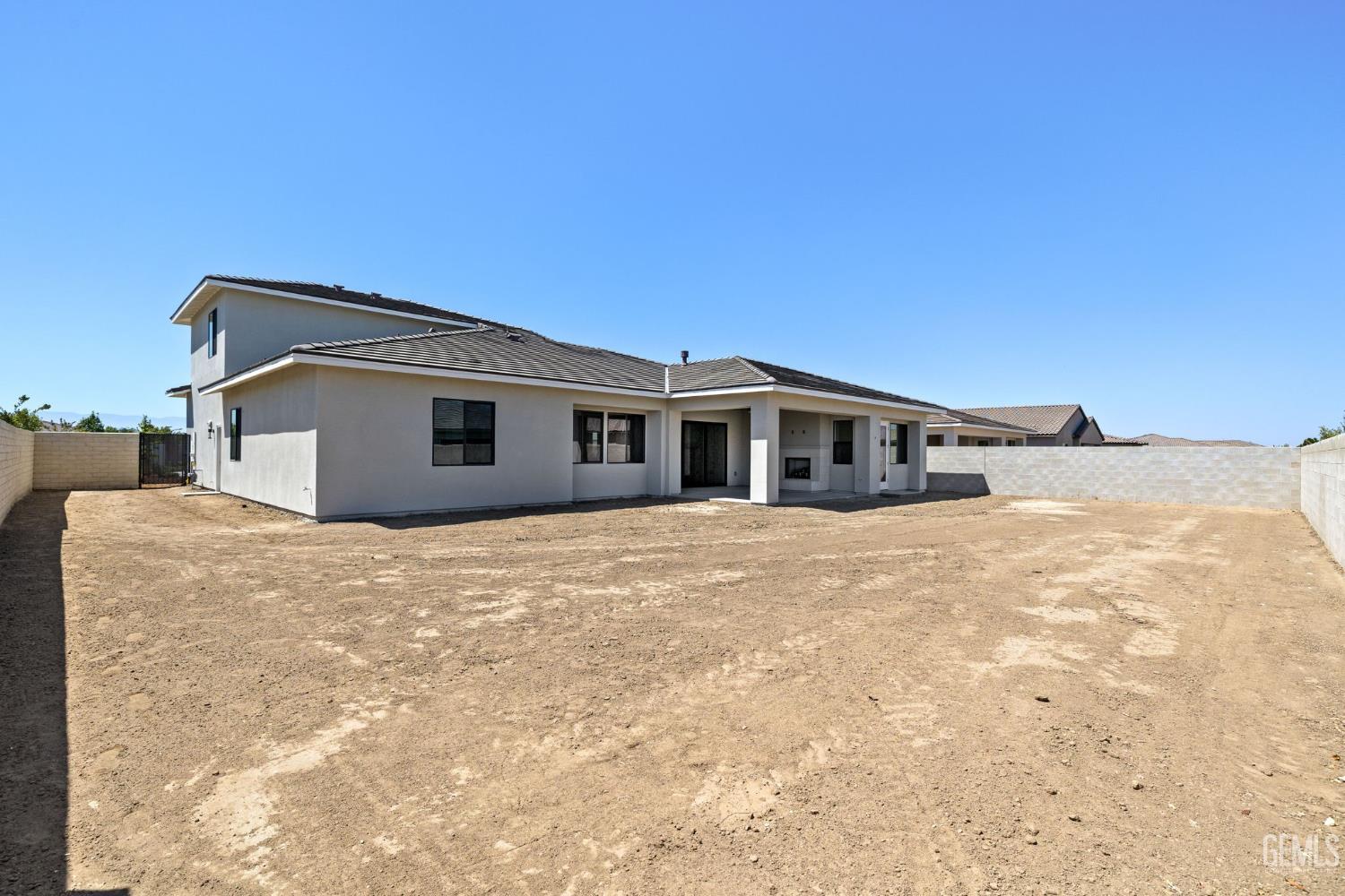 Undisclosed Address Bakersfield, CA 93311 - Photo 60 of 71 a big house with a big yard and large trees