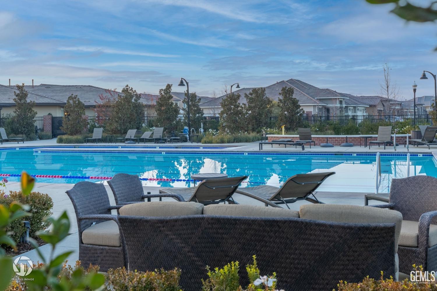 Undisclosed Address Bakersfield, CA 93311 - Photo 69 of 71 a roof deck with couches and wooden floor