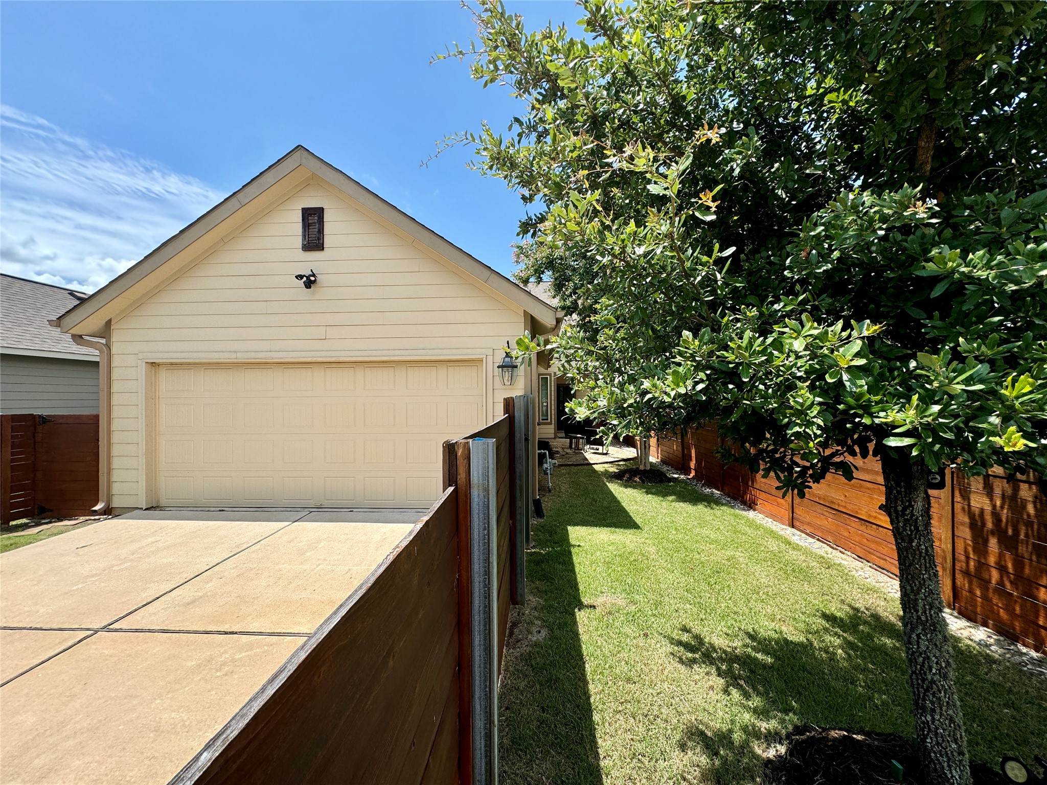 5904 Baythorne Drive Austin, TX 78747 - Photo 16 of 24 Garage alley entrance and parking
