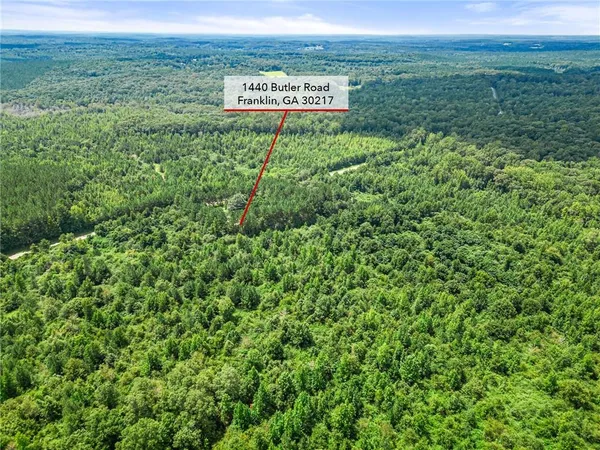 a view of a sign board in a field