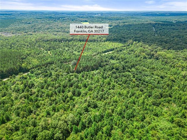 a view of a sign board in a field