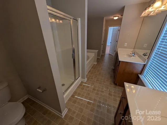 view of a bathroom with a sink and toilet