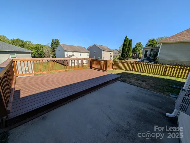 a view of a balcony with chairs