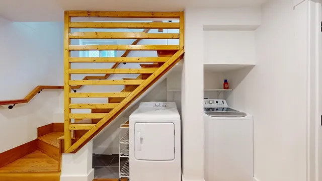 a view of entryway with wooden floor