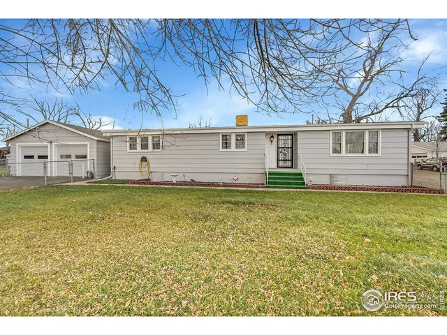 a view of a house with a swimming pool