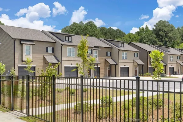 a front view of a house with a balcony
