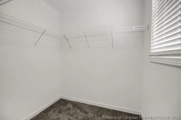a view of a room with racks on the wall