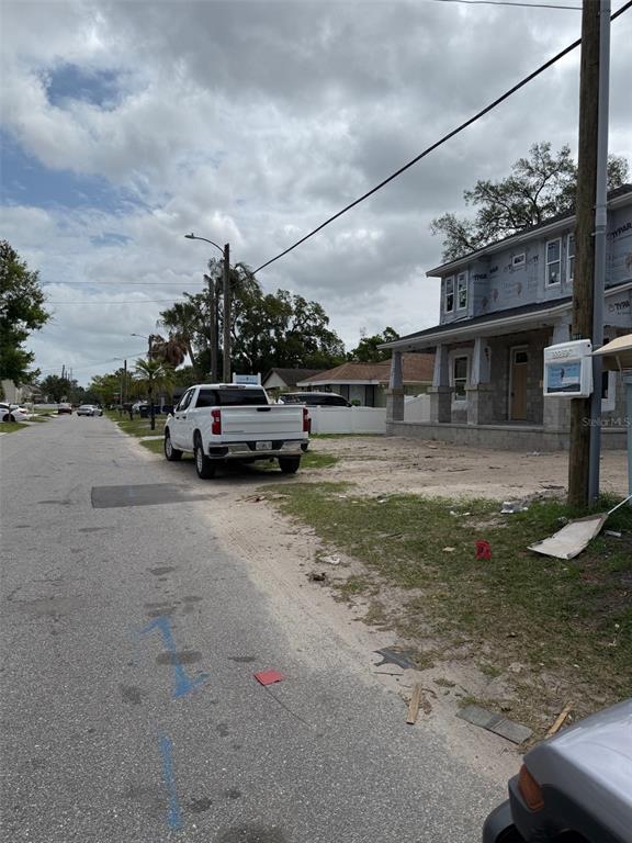 1522 West Arch Street Tampa, FL 33607 - Photo 5 of 6 a car parked in front of a house