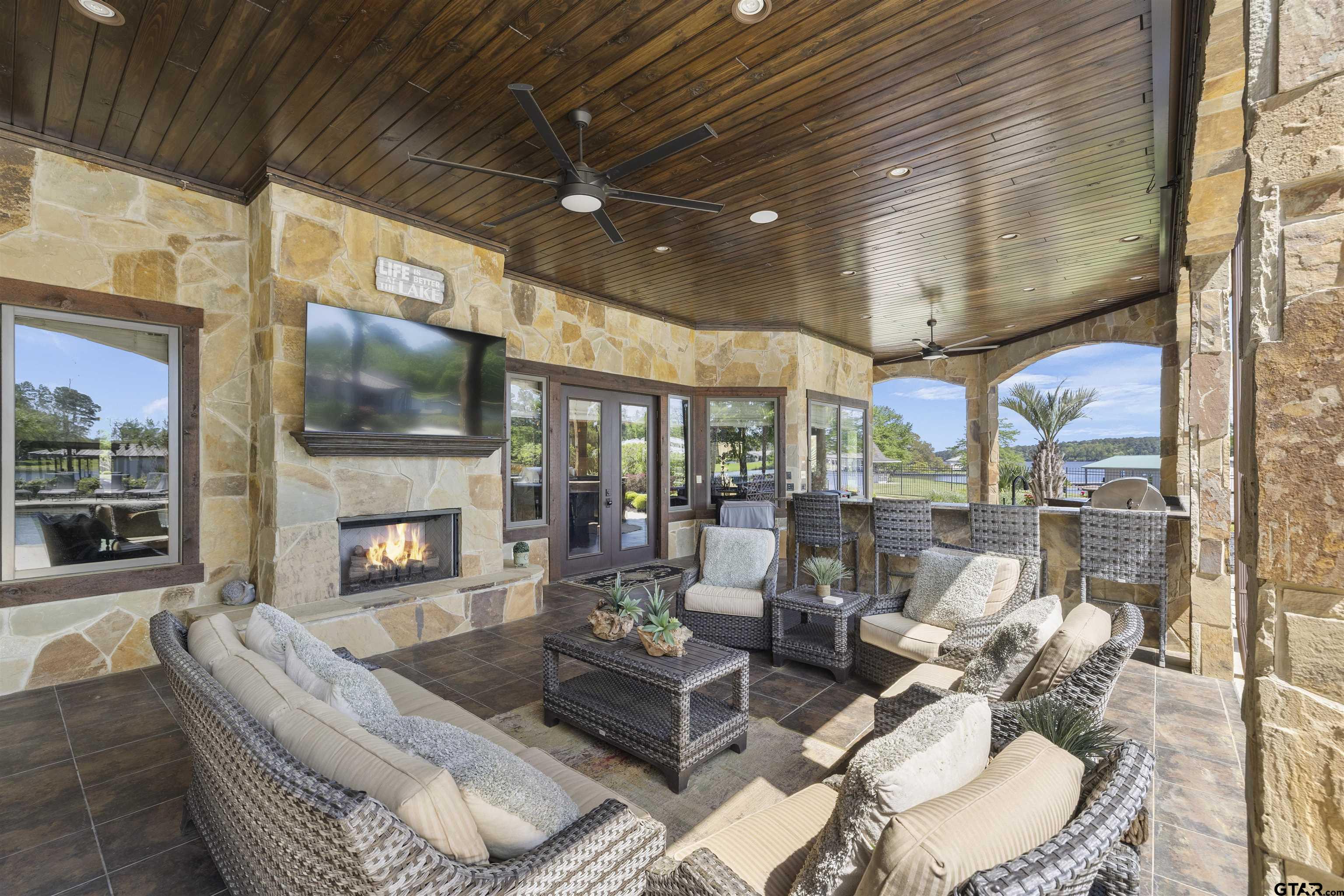 17873 Slack Road Whitehouse, TX 75791 - Photo 21 of 48 a living room with fireplace furniture and a flat screen tv