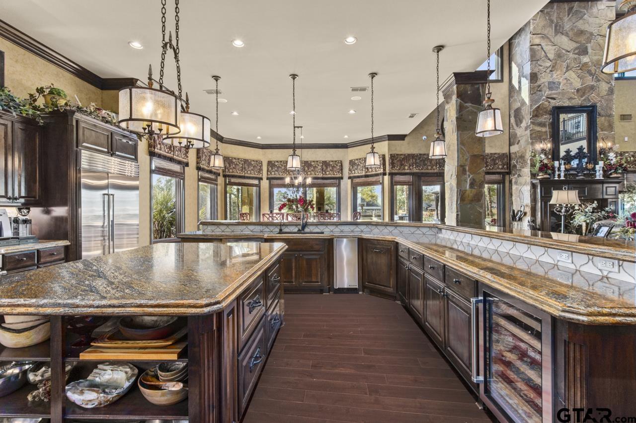 17873 Slack Road Whitehouse, TX 75791 - Photo 27 of 48 a kitchen with stainless steel appliances granite countertop a stove and a sink