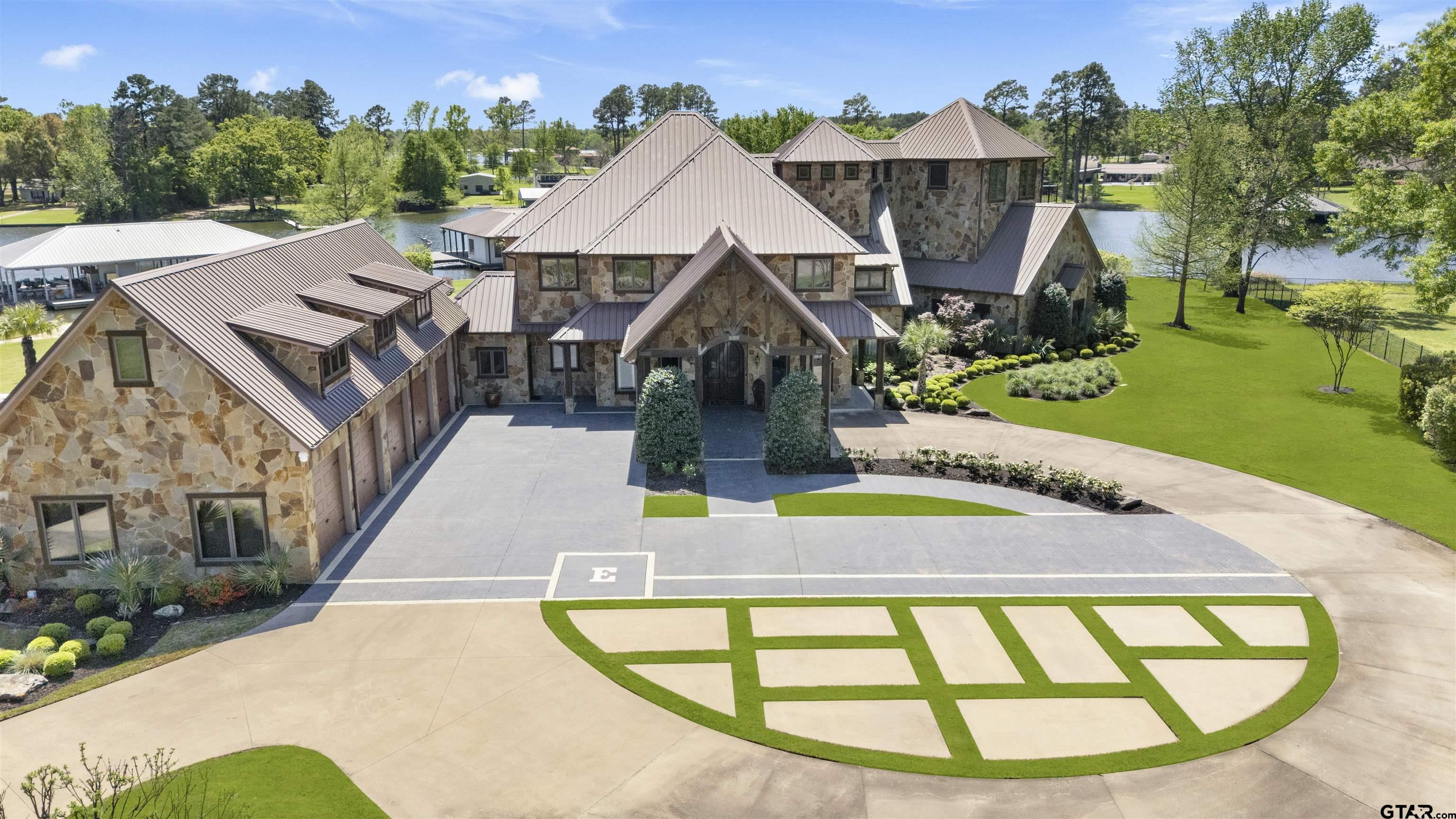 17873 Slack Road Whitehouse, TX 75791 - Photo 3 of 48 an aerial view of a house with a swimming pool
