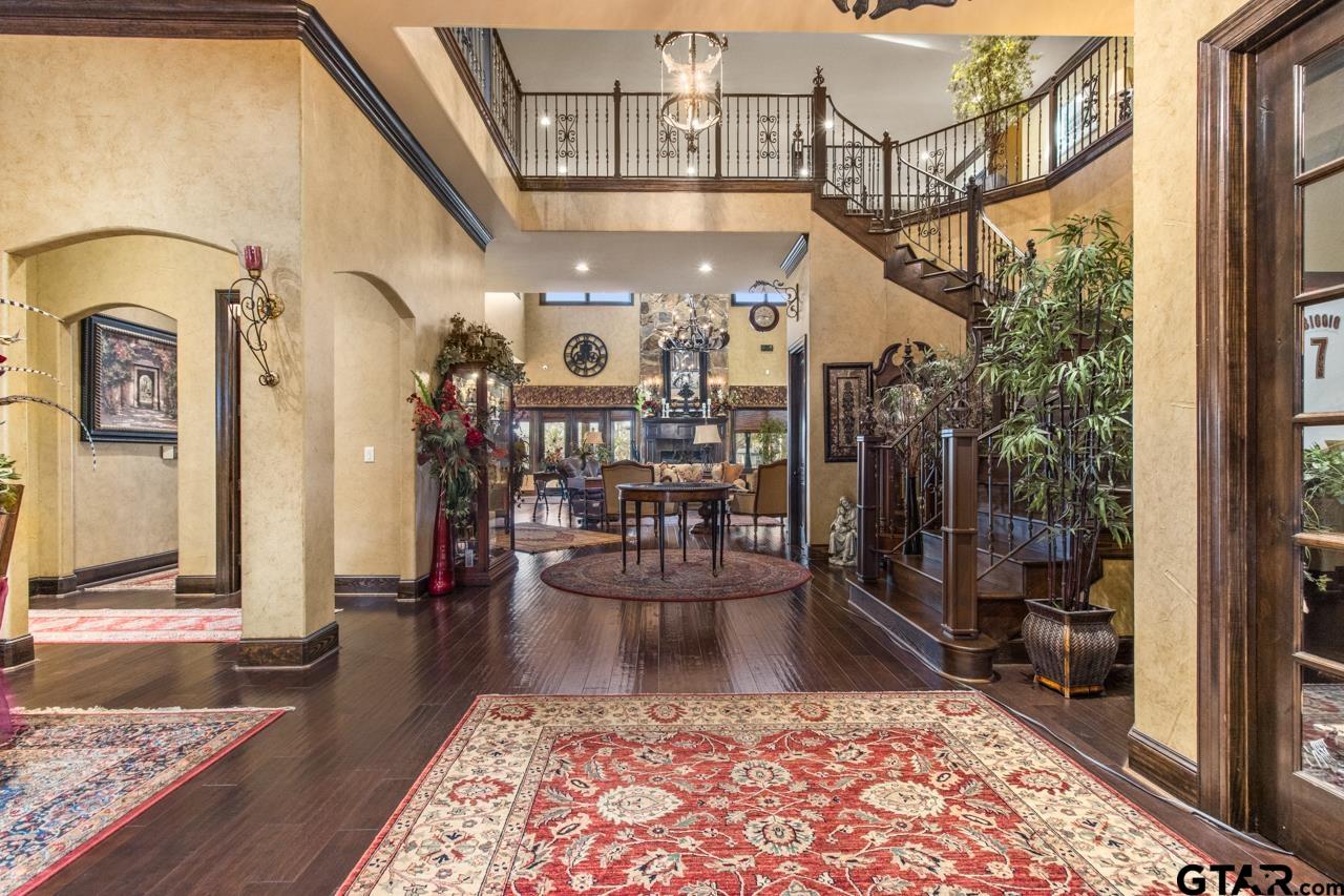 17873 Slack Road Whitehouse, TX 75791 - Photo 32 of 48 a view of a hallway with a dining table and a rug