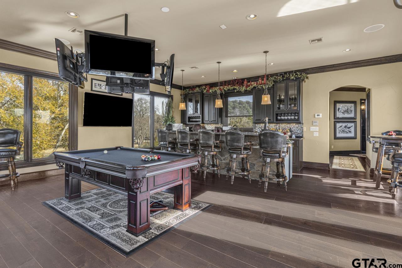 17873 Slack Road Whitehouse, TX 75791 - Photo 37 of 48 a kitchen with stainless steel appliances granite countertop a stove and a view of living room