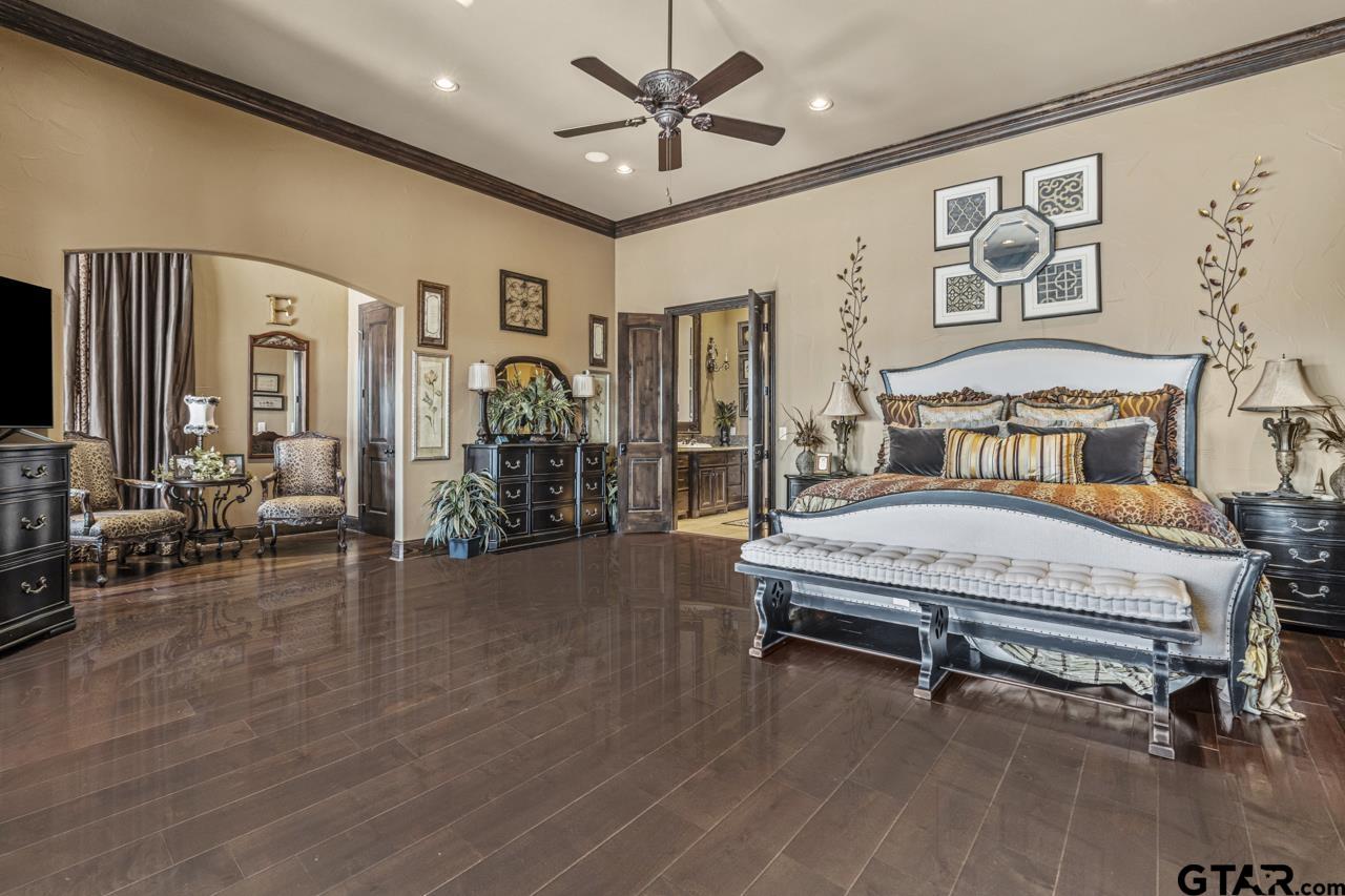 17873 Slack Road Whitehouse, TX 75791 - Photo 41 of 48 a bedroom with a bed furniture and a flat screen tv