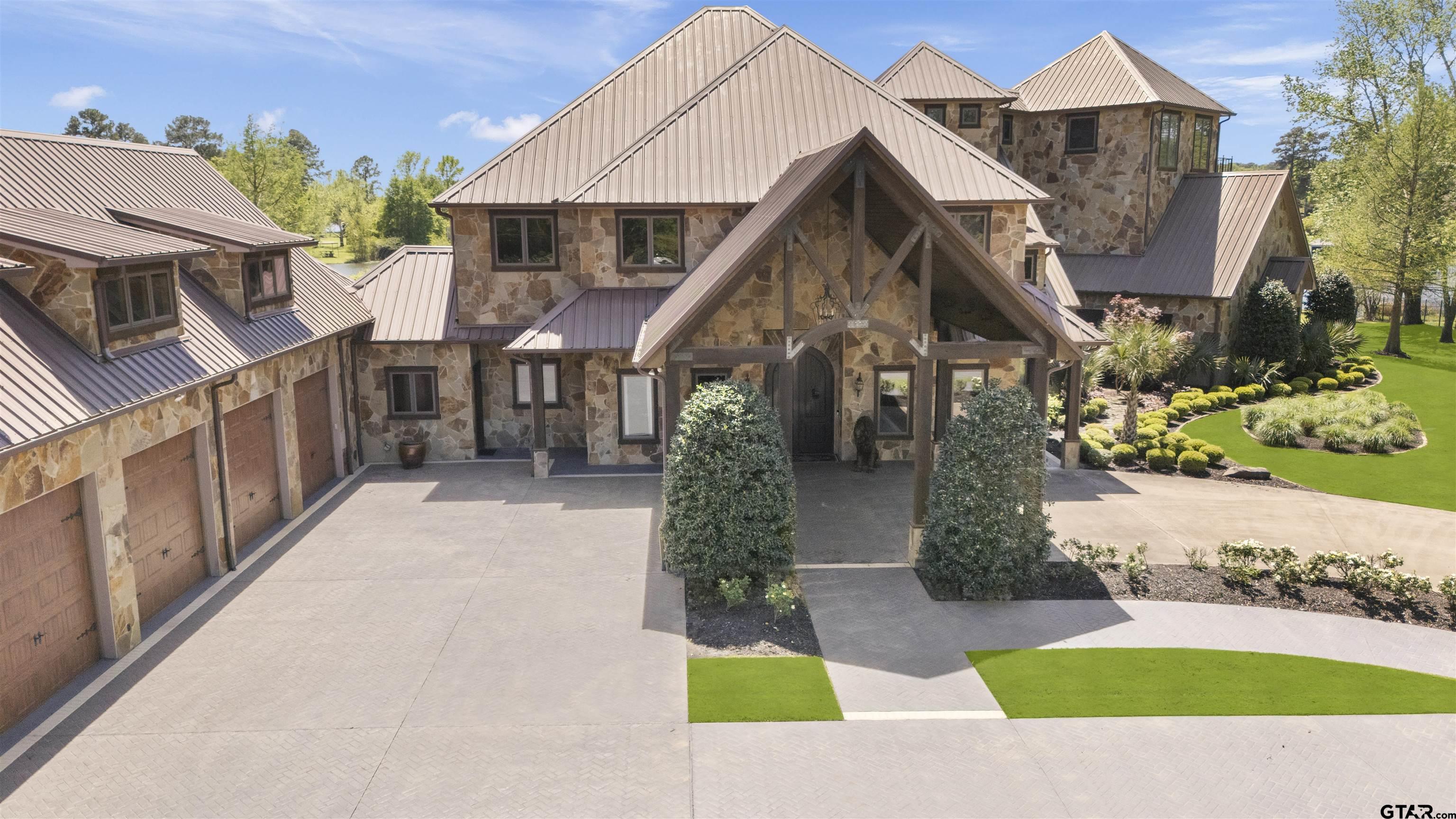 17873 Slack Road Whitehouse, TX 75791 - Photo 8 of 48 a view of a house with a small yard and a fountain