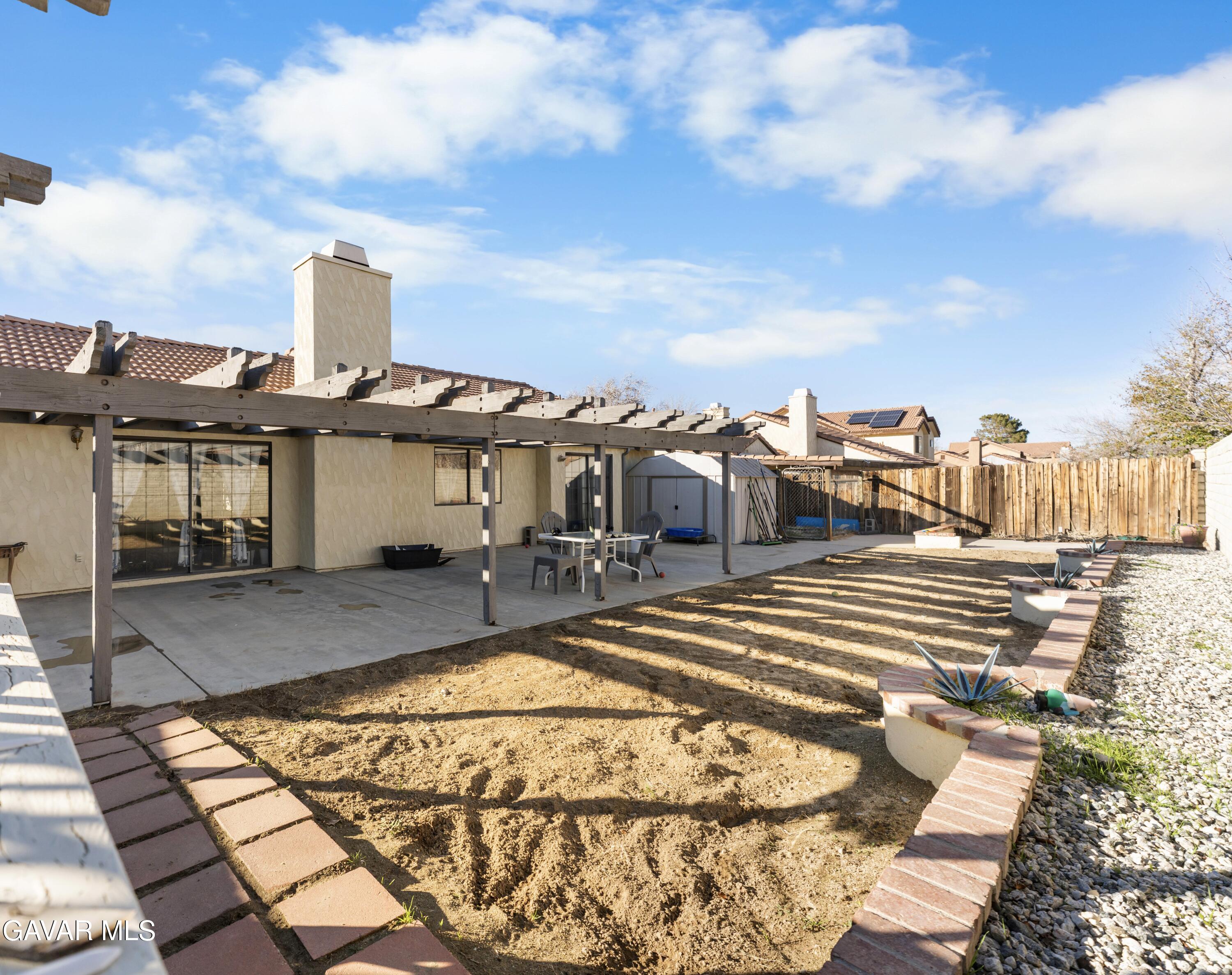 37720 Smoke Tree Street Palmdale, CA 93552 - Photo 11 of 16 a view of a terrace with chairs