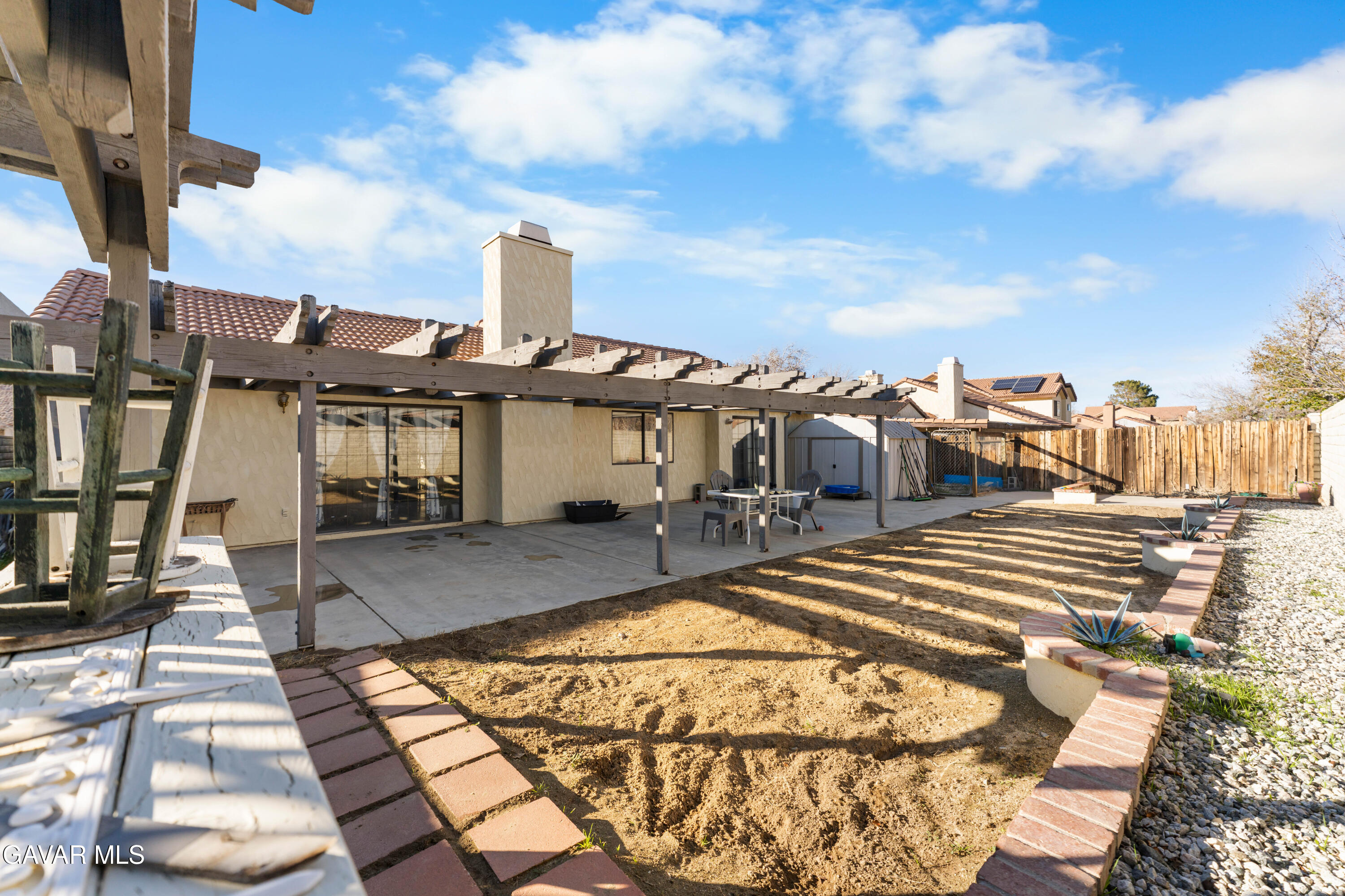 37720 Smoke Tree Street Palmdale, CA 93552 - Photo 15 of 17 a view of a swimming pool with sitting area