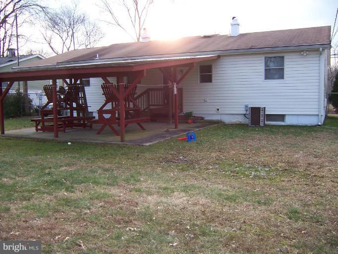 307 Brock Bridge Road Laurel, MD 20724 - Photo 8 of 15 Covered patio and picnic tables