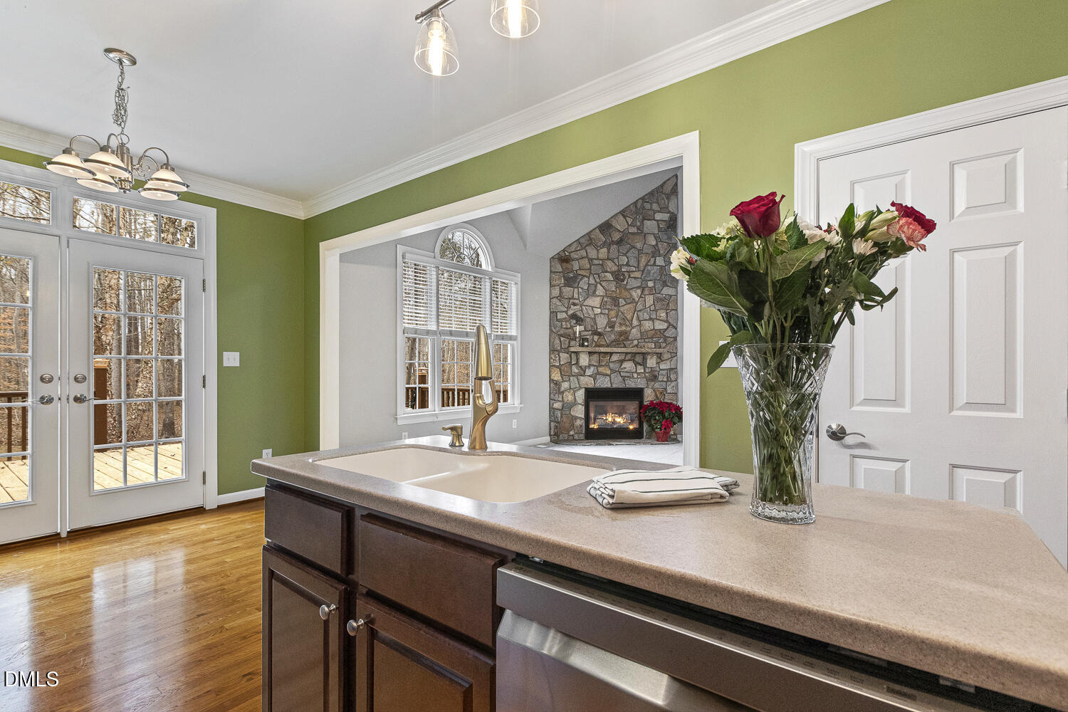 1119 Corrina Road Wake Forest, NC 27587 - Photo 18 of 45 a view of a dining room with furniture chandelier and wooden floor