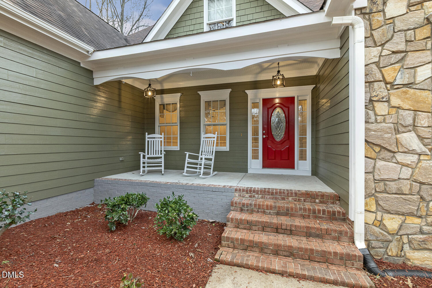 1119 Corrina Road Wake Forest, NC 27587 - Photo 3 of 45 a front view of a house with entryway
