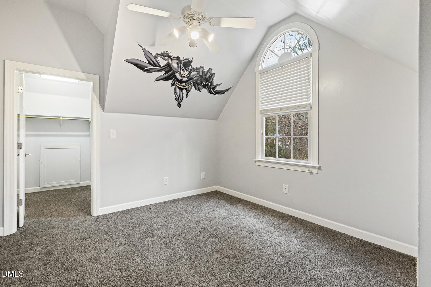 1119 Corrina Road Wake Forest, NC 27587 - Photo 38 of 45 an empty room with windows and chandelier