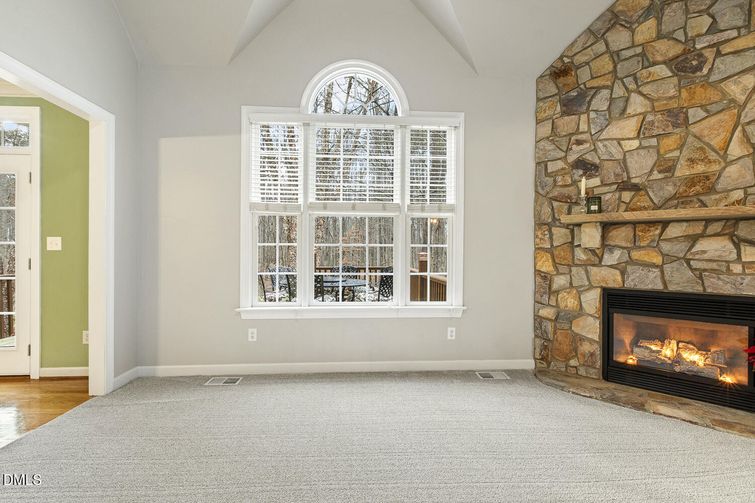 1119 Corrina Road Wake Forest, NC 27587 - Photo 9 of 45 a view of a fireplace and window in a room