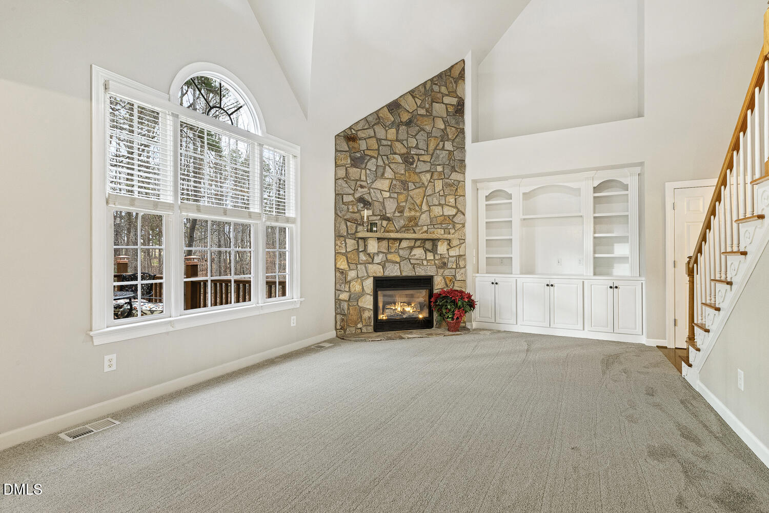 1119 Corrina Road Wake Forest, NC 27587 - Photo 10 of 45 a view of an empty room with furniture and a fireplace