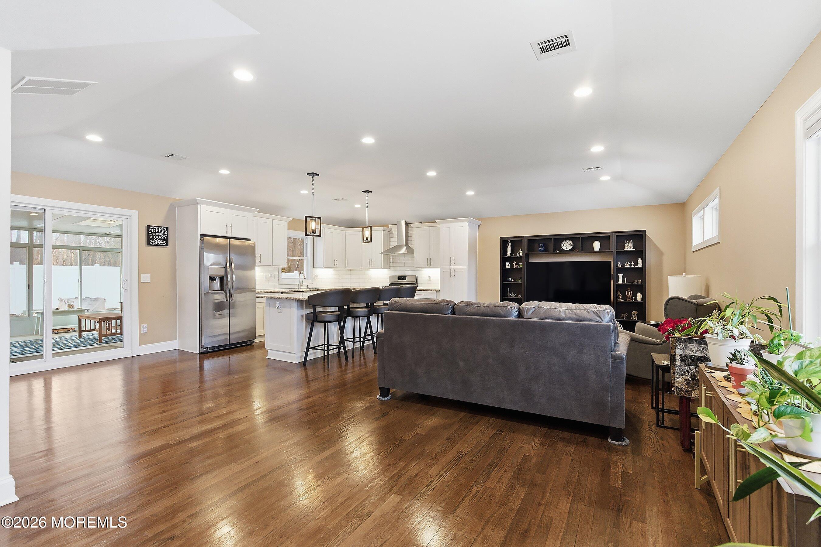 749 Hardean Road Brick, NJ 08724 - Photo 13 of 22 a living room with furniture and a wooden floor