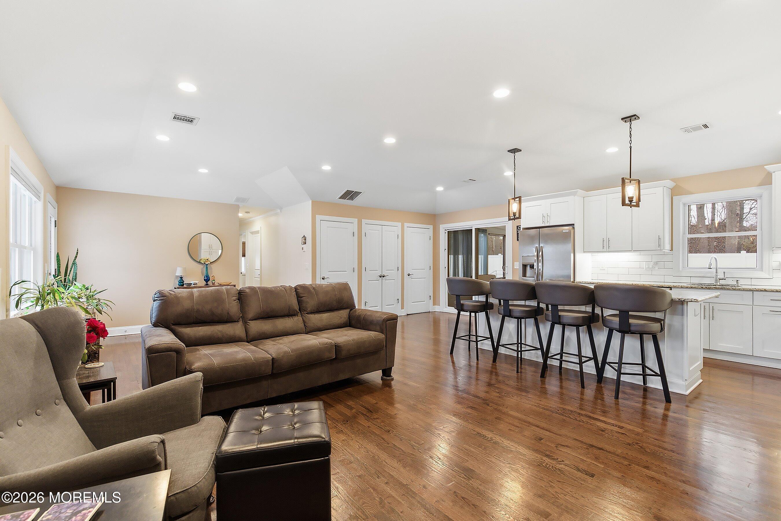 749 Hardean Road Brick, NJ 08724 - Photo 22 of 22 a living room with furniture and wooden floor