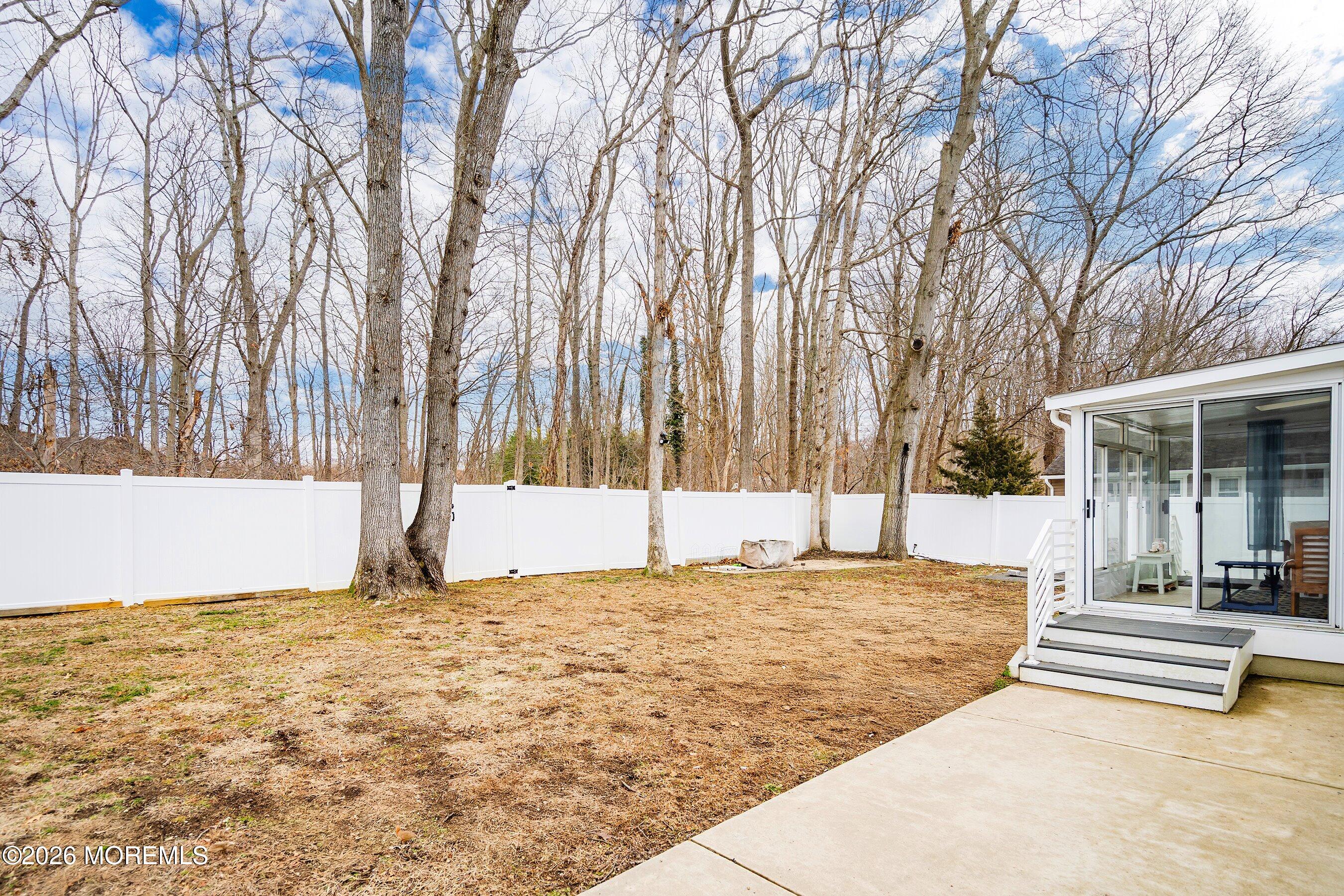 749 Hardean Road Brick, NJ 08724 - Photo 6 of 22 a view of a house with snow on the ground