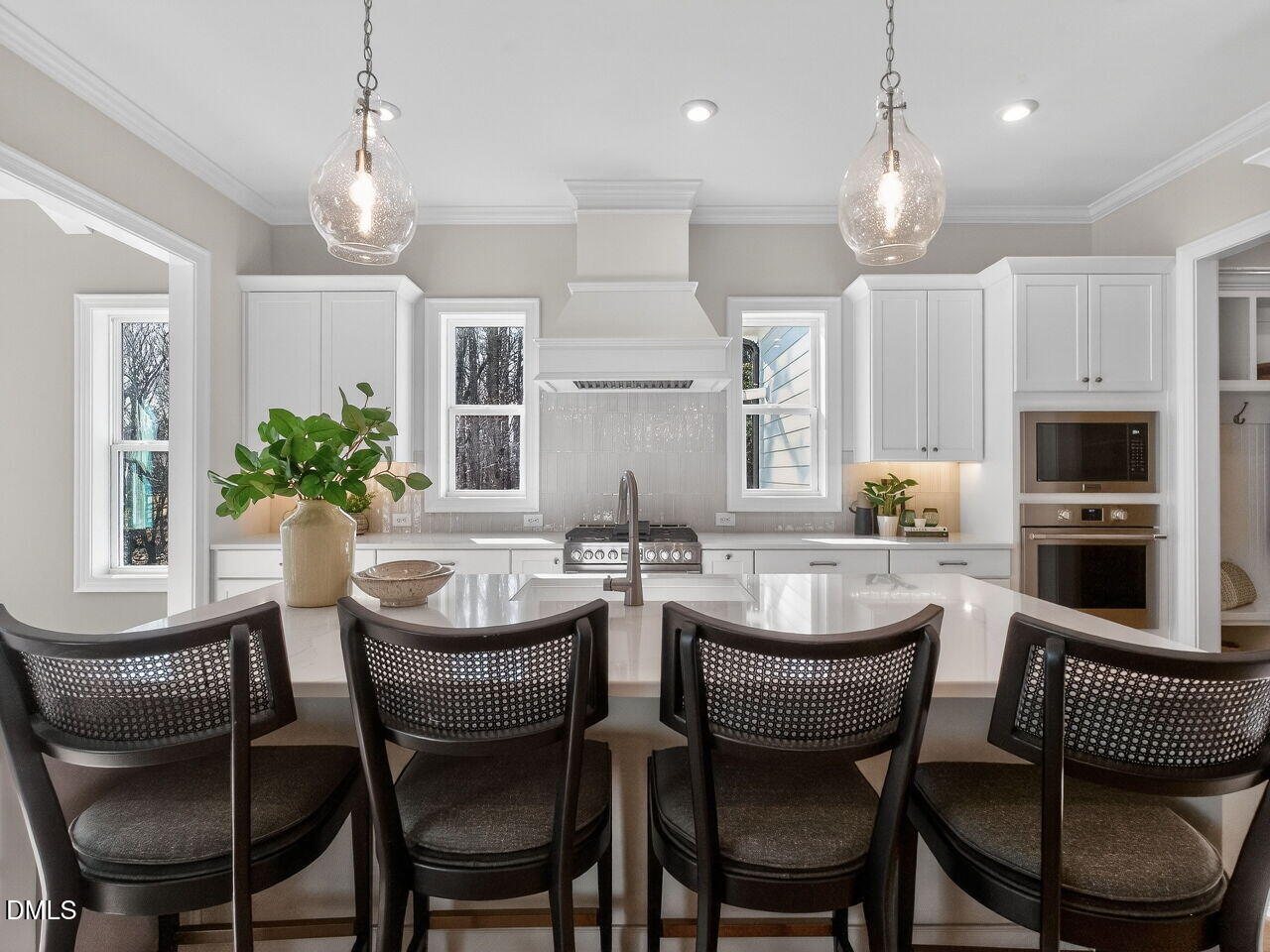 8912 Thompson Mill Road Wake Forest, NC 27587 - Photo 17 of 41 a dining room with furniture a chandelier and window