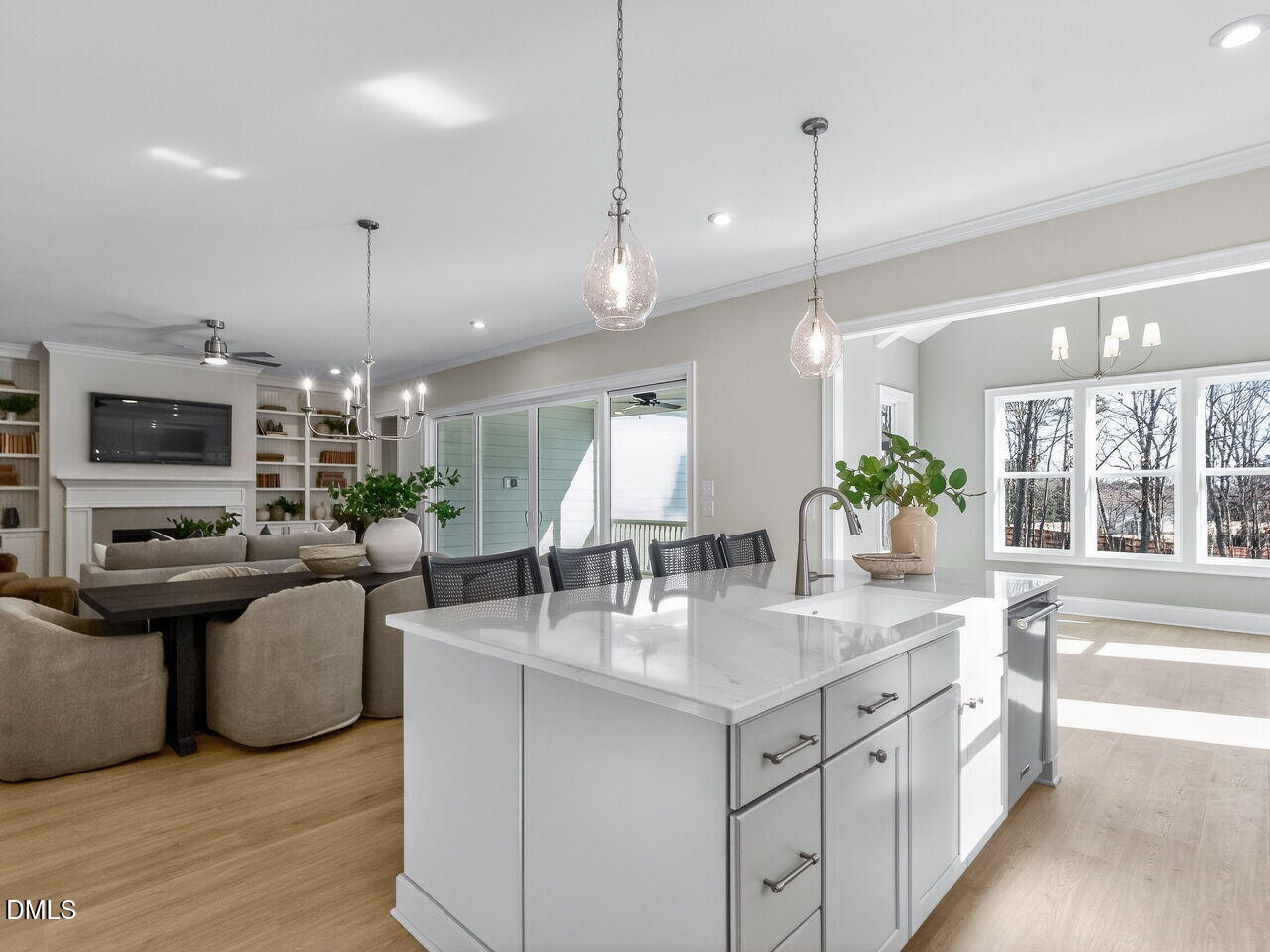 8912 Thompson Mill Road Wake Forest, NC 27587 - Photo 20 of 41 a kitchen with stainless steel appliances granite countertop kitchen island a stove and a sink