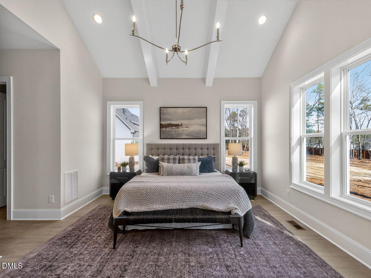 8912 Thompson Mill Road Wake Forest, NC 27587 - Photo 31 of 41 a bedroom with a large bed and a window